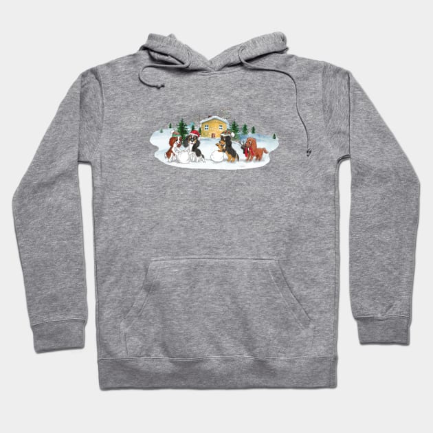 Cavalier King Charles Spaniels in the Snow Building a Snowman Hoodie by Cavalier Gifts